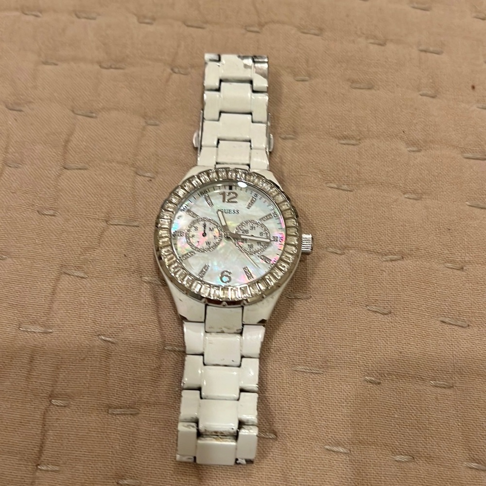 Guess watch mother of pearl face and rhinestone bezel